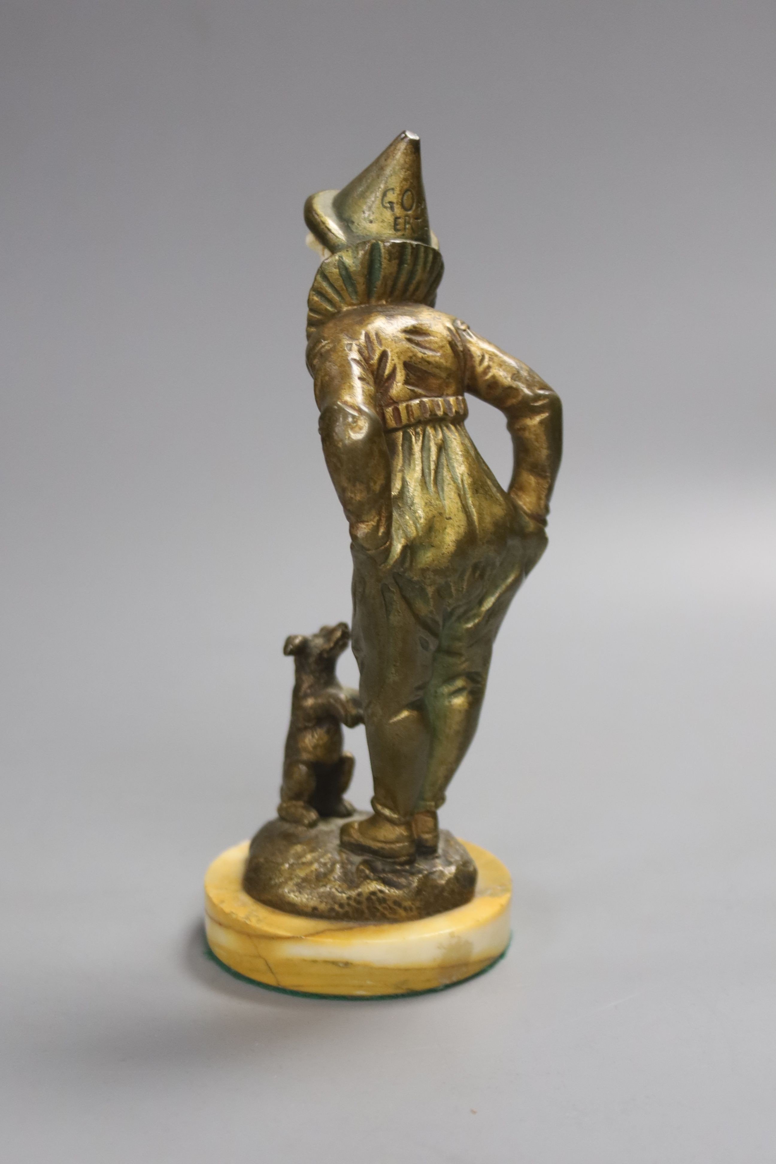 Georges Omerth. An Art Deco gilt bronze and ivory of a pierrot and dog, height 20cm